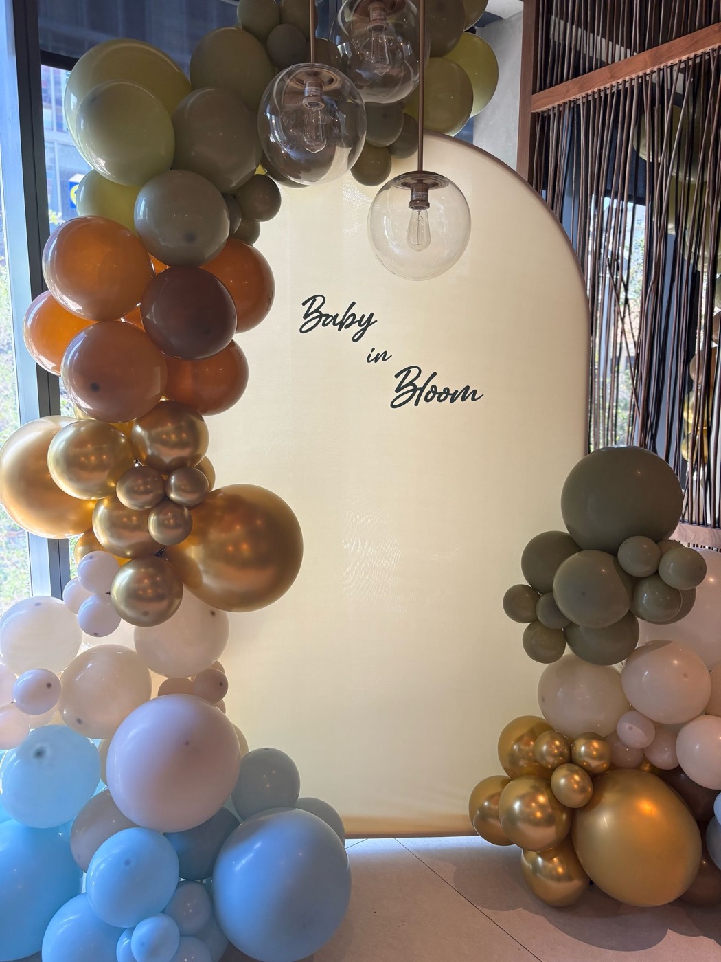 Baby in Bloom event backdrop with neutral balloon installation